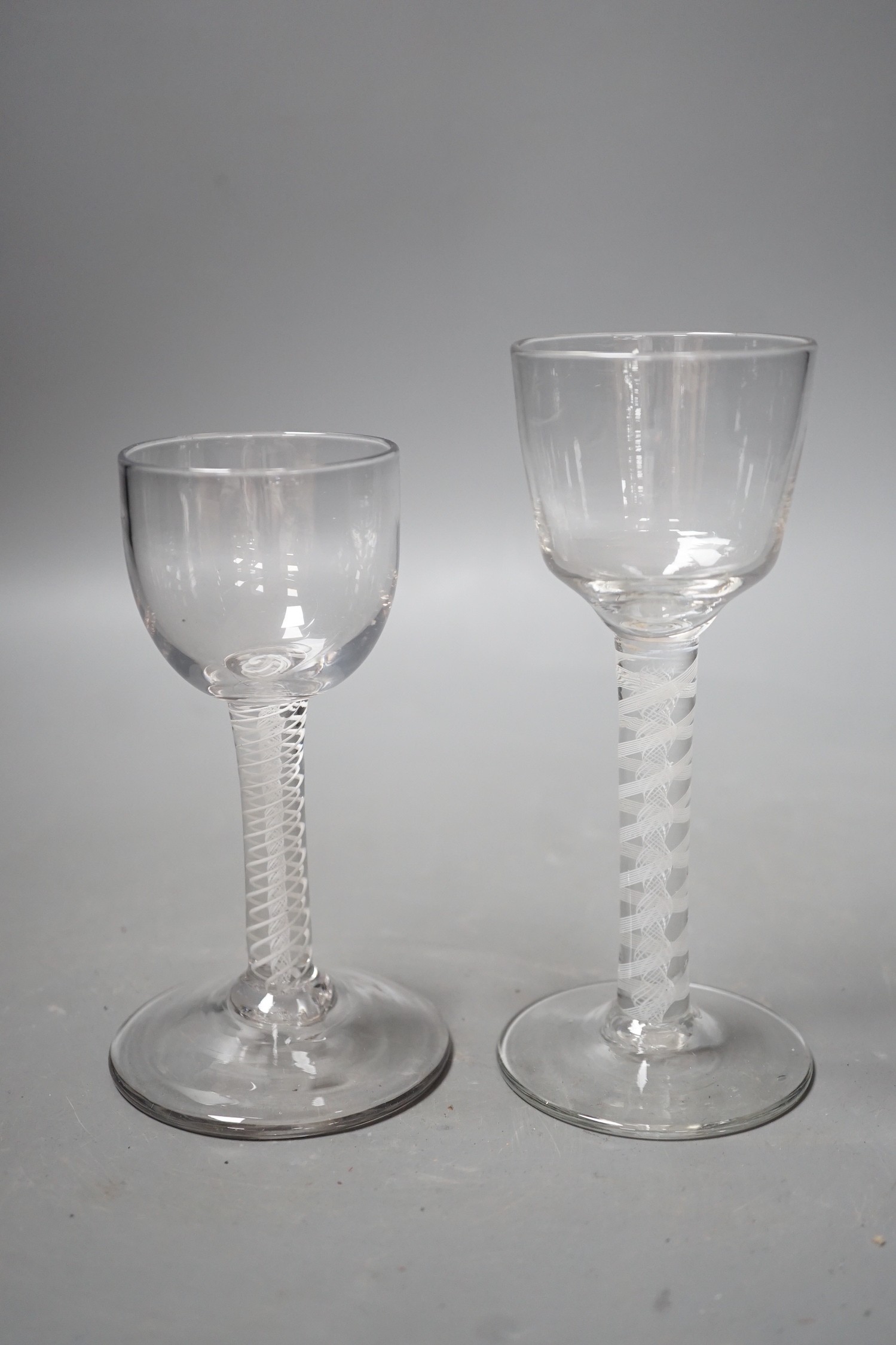 Two 18th century DSOT stem wine glasses, tallest 15cm